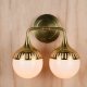 Brass Two Light Glass Globe Shaded Wall Scocne #0