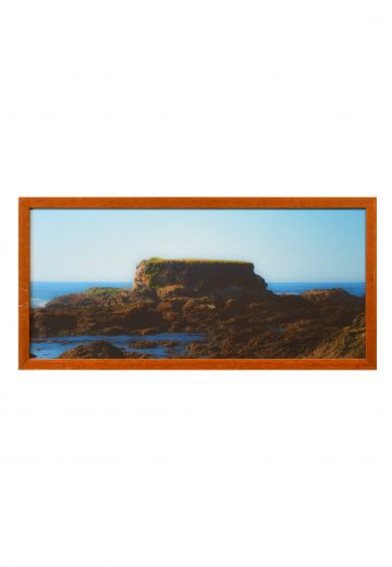 Wooden Framed Rock Formation Photograph