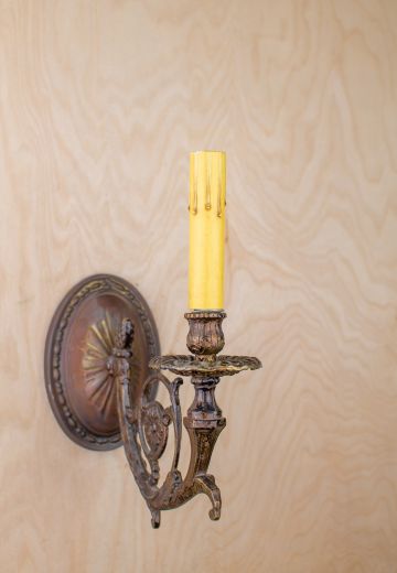 Single Curved Arm Wall Sconce